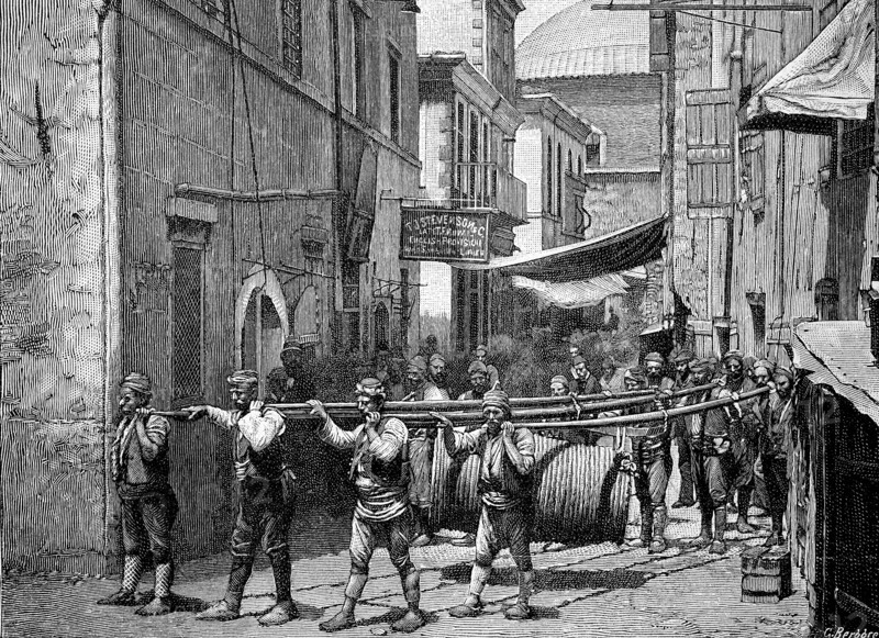 Load Carriers In Armenia Carry A Large Pulley With Wire Rope