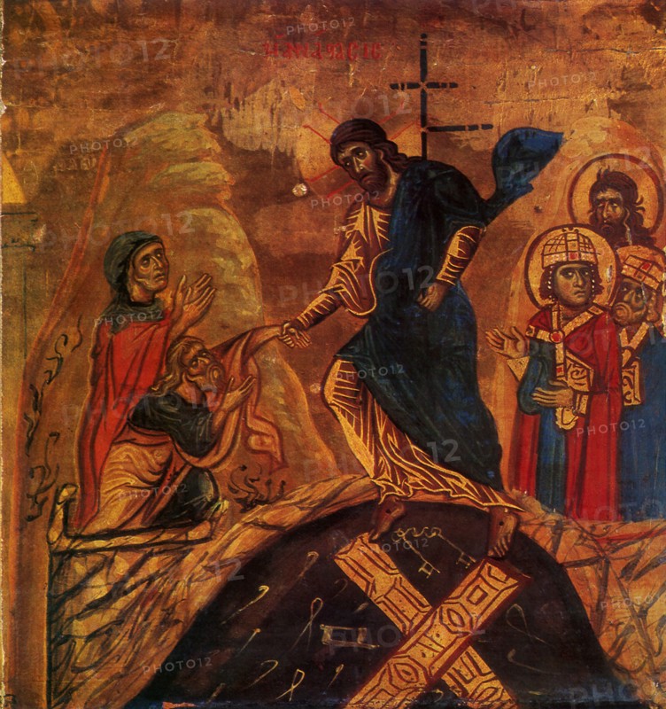 Jesus grabs Adam by the Wrist.