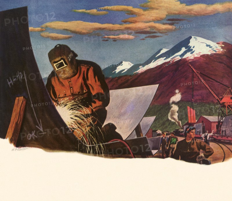 Sheet metal worker welding in the mountains.