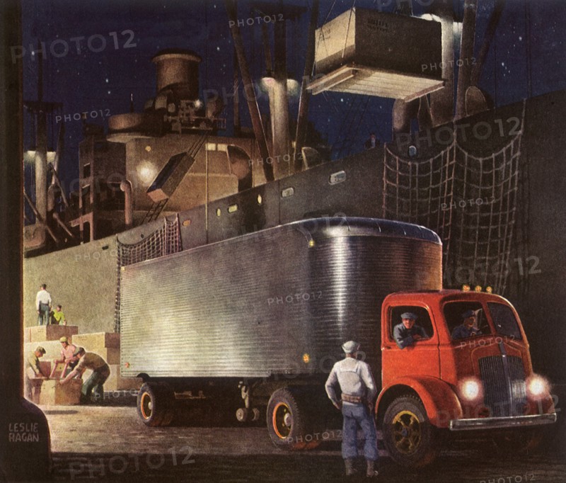 Truck next to Ship loading cargo at night.
