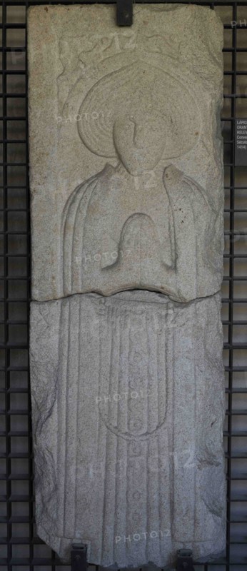 Tombstone with prayer figure in bas-relief