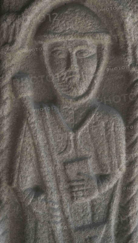 Bas-relief sculpture depicting a pilgrim