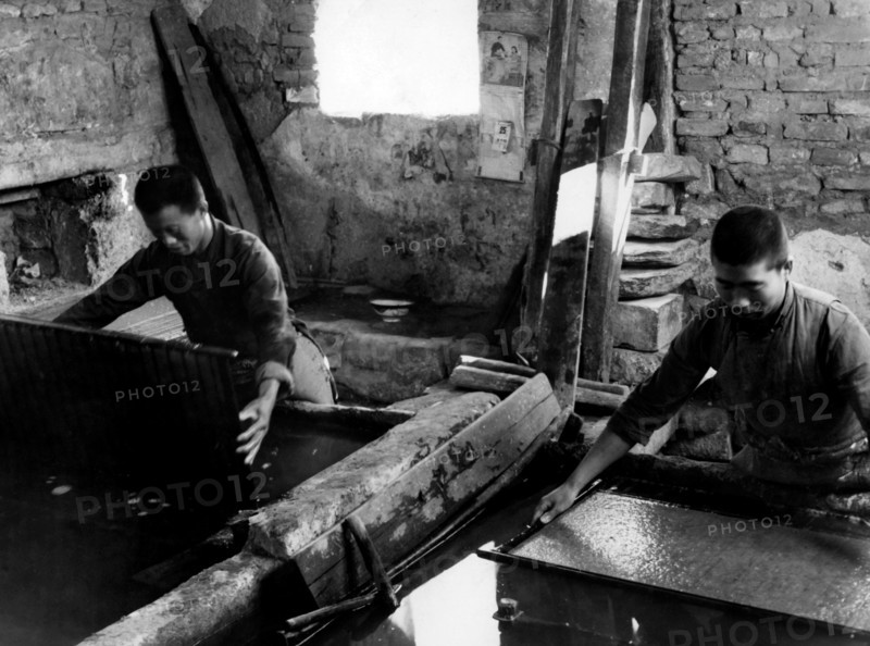 Paper Recycling. Processing Of The Mass Of Paper Dissolved In A Tub. China 1940-50