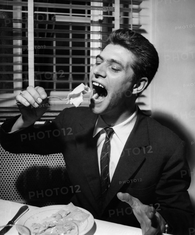 Man Eating Italian Food. Tortelli With Vegetables. 1964