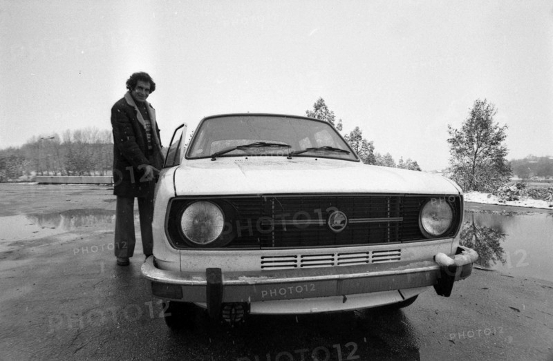 Young man demonstrates just bought him a car Skoda.