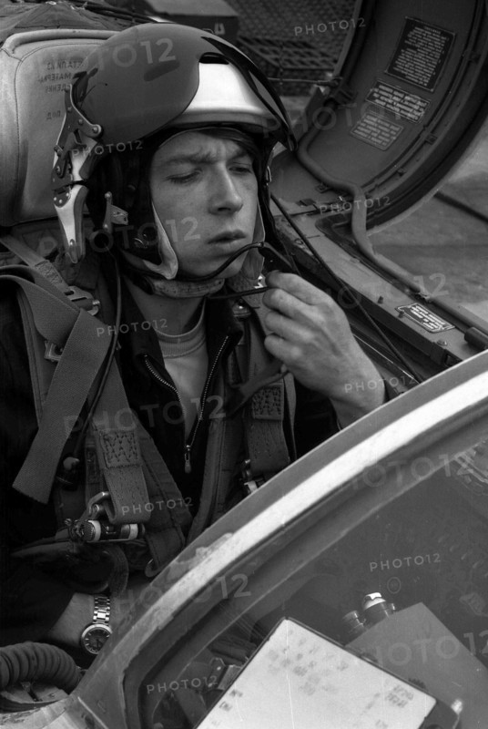 Pilot Lieutenant Valerii Poltoranin, testing avionics in the cockpit MiG-21.