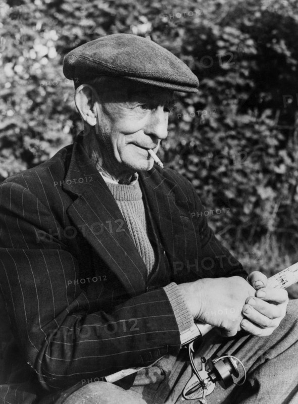 An elderly fisherman.