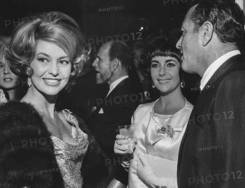 Cyd Charisse, Liz Taylor and Tony Martin.