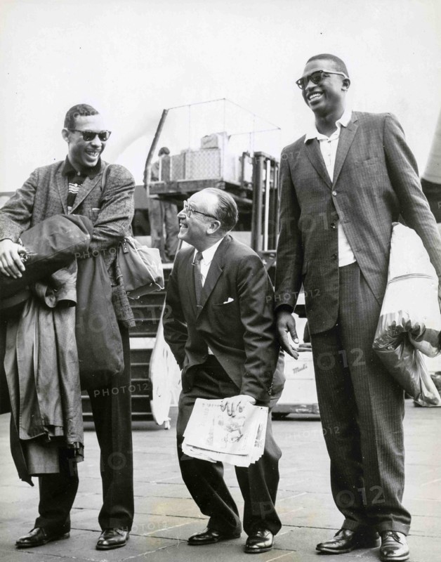 Harold Lloyd Between Two Players Of The Harlem Globetrotters.