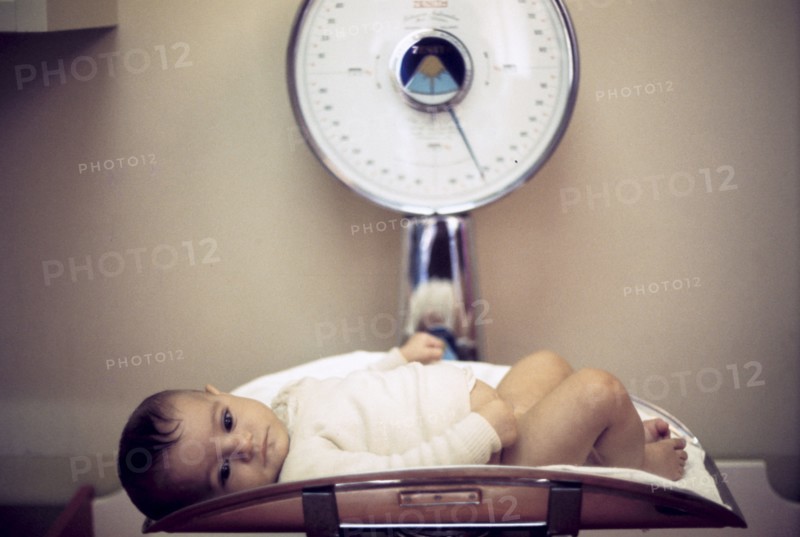 Newborn on a balance, 70's