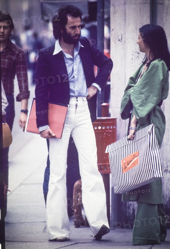 Couple on the road, milan, 70's