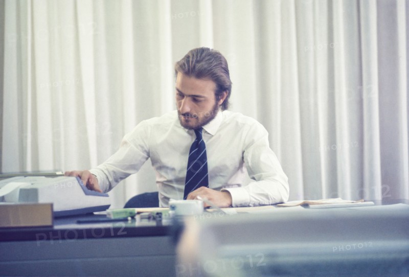 Man in office, 80's