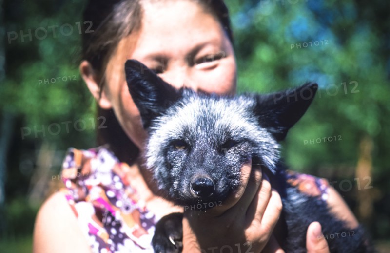 Ussr, siberia, jakutsk,  jakutian girl with a fox