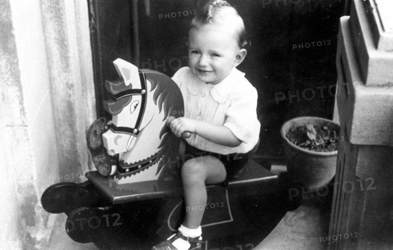 Child on rocking horse
