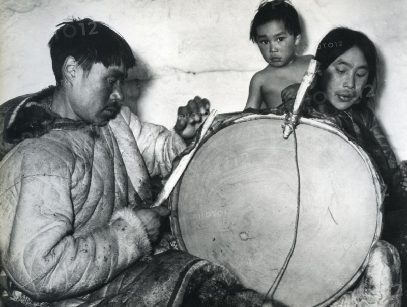 Eskimos cut the seal skin