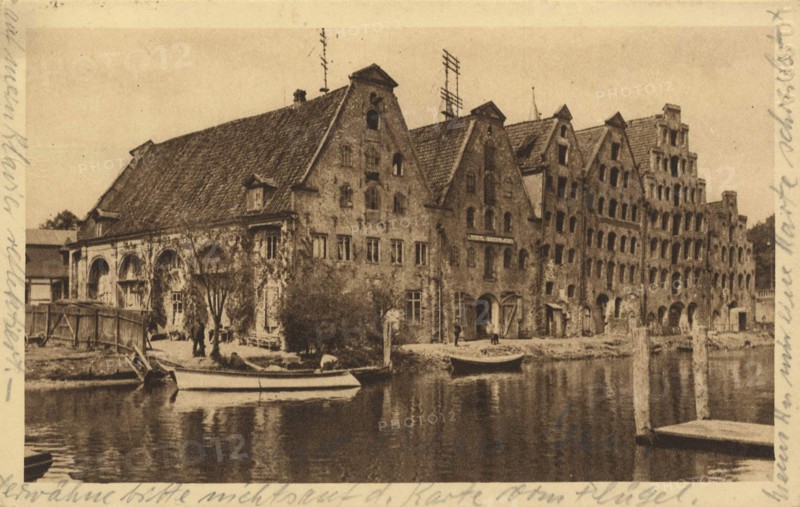 Old granaries at the river Trave, Lübeck, Schleswig-Holstein, Germany, view from c. 1910, digital reproduction of a public domain postcard.