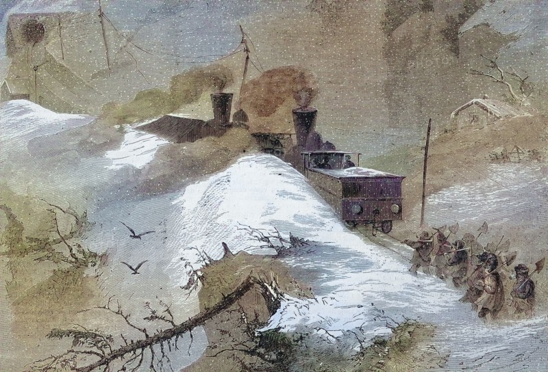 a crashed train in the middle of the snow on the railroad line over the Brenner Pass