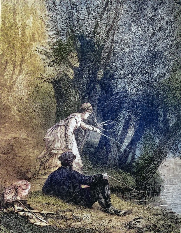Young Couple Fishing At The Lake