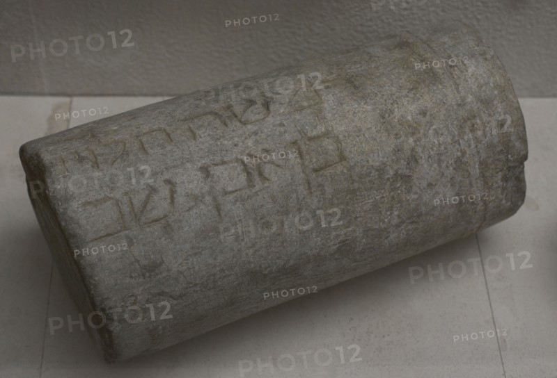 Fragment of a funerary cippus.
