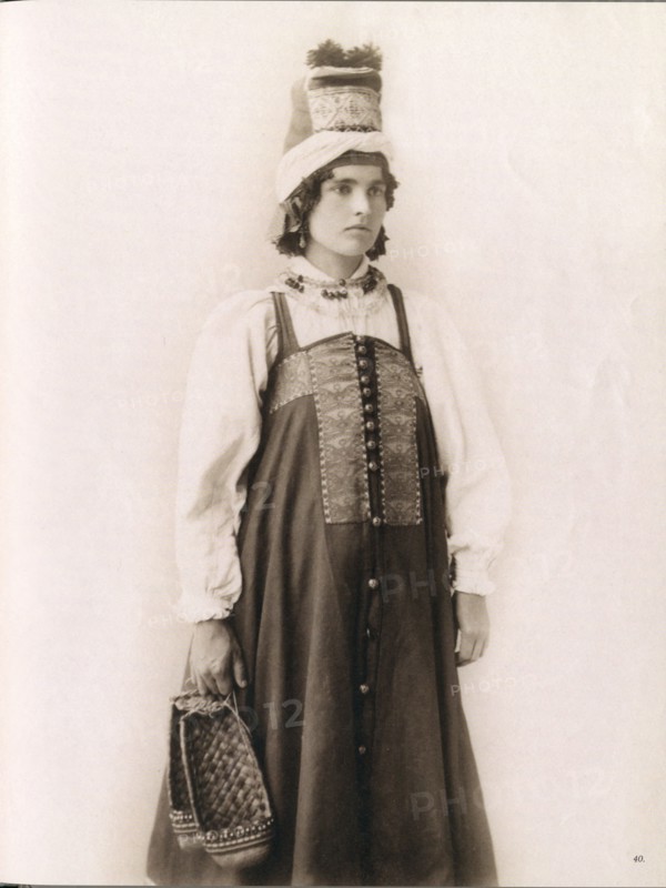Young Russian woman in traditional cultural dress from Southern Russia
