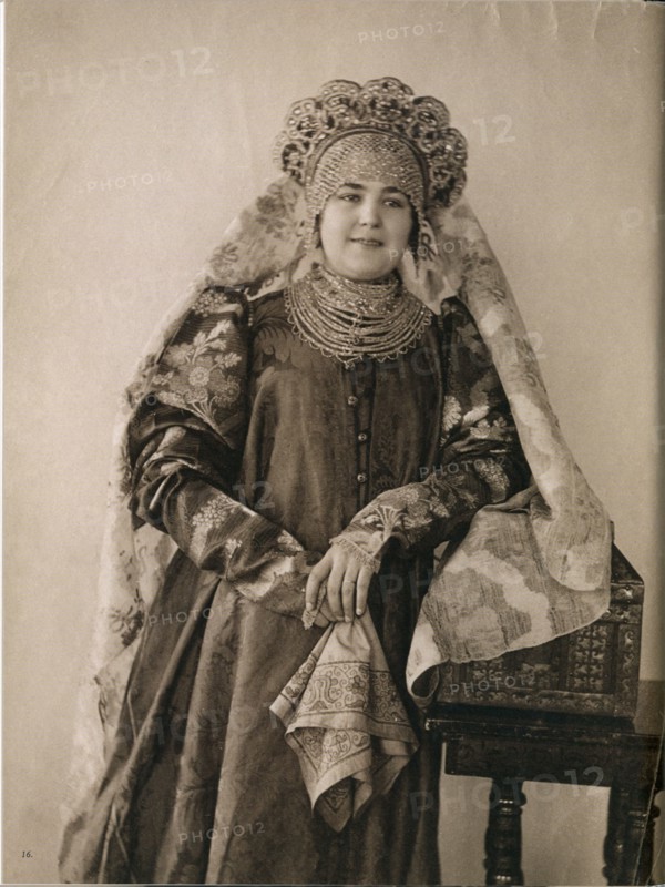 Young Russian woman in traditional cultural dress from Northern Russia