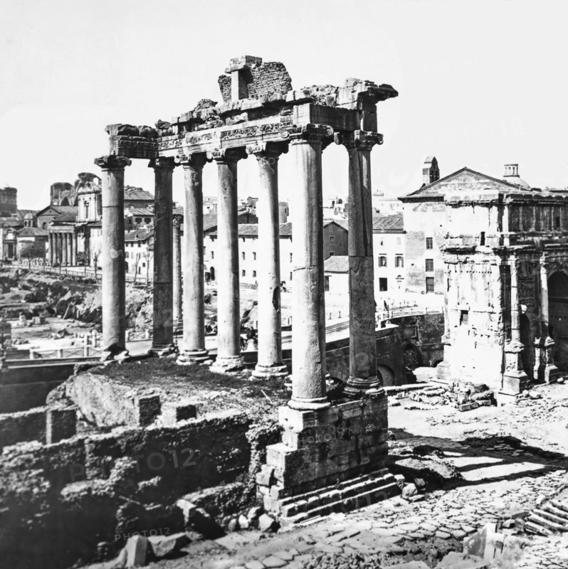 Ruins Of The Temple Of Saturn In The Roman Forum, Rome, Italy.