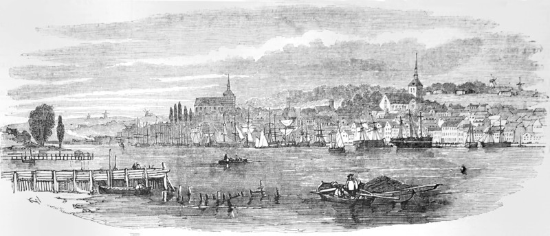 The river at Flensburg, Germany, with sailing ships and boats.