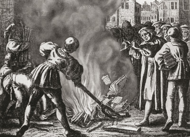 Martin Luther publicly burning papal bull of excommunication at  Wittenberg in 1520.