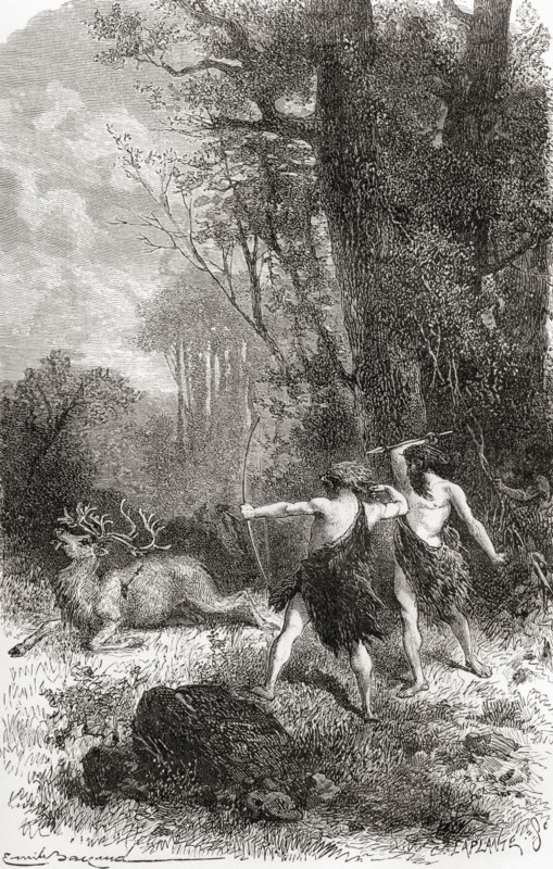 Neanderthal hunters kill a reindeer during prehistoric times.