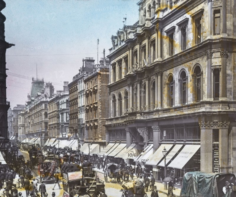 Cheapside busy street with horse drawn bus, coaches, shops and people.