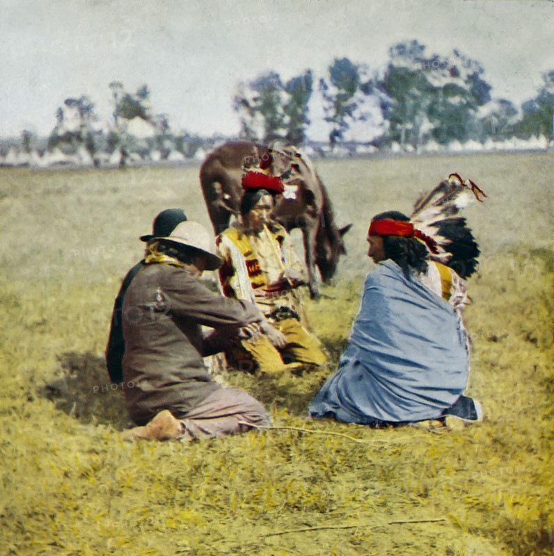 Passing the peace pipe around the council, native American Indians.