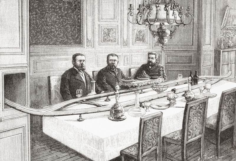 A 19th century miniature electric railway track used for serving meals at the table.