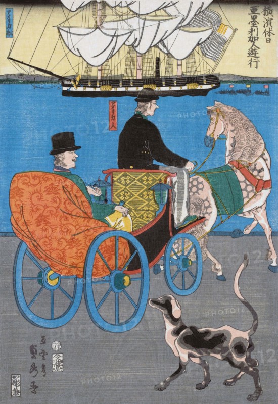A tourist takes a horse and cart ride around the harbour of Yokohoma.