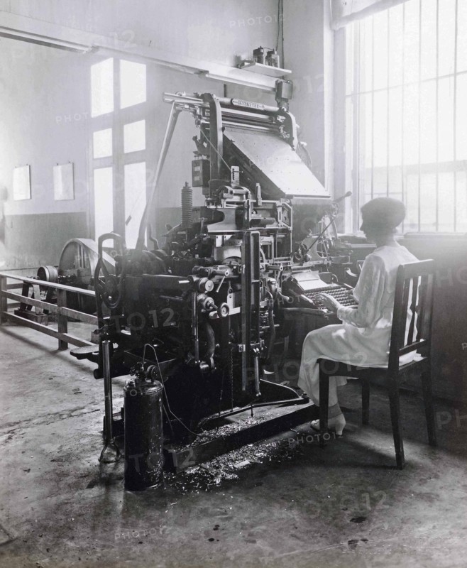 Woman working at a type-setting machine in the printworks of the Deli Courant in Medan.