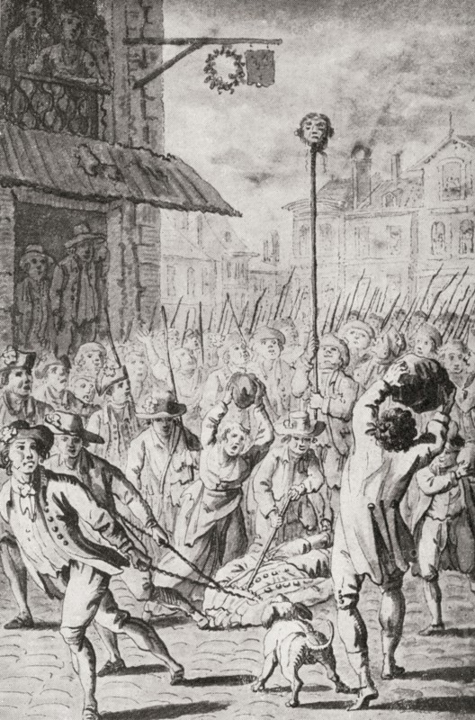 The head of Joseph-Francois Foullon de Doue stuck on a pike and paraded through the streets of Paris after being beheaded by the crowd during the French Revolution in 1789.