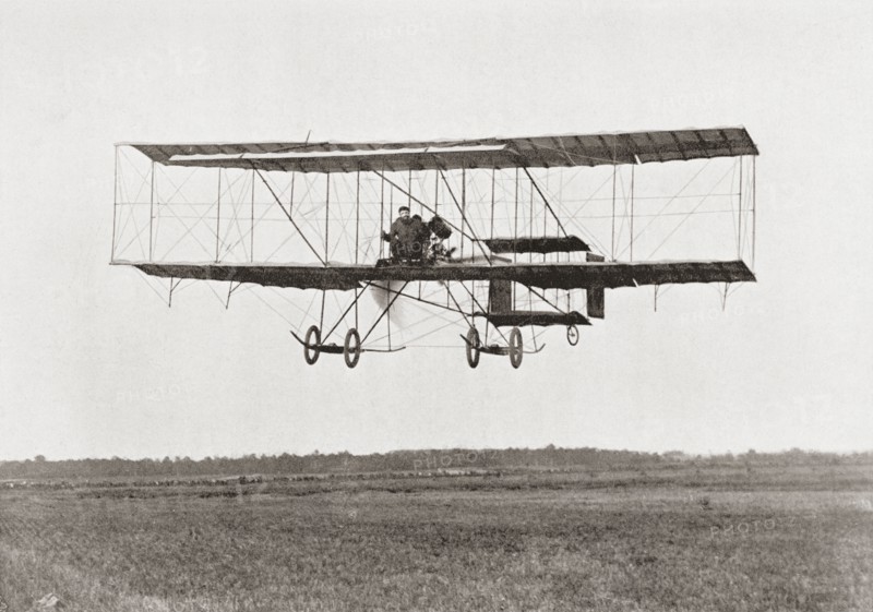 Henri Farman winning the Grand Prix of two thousand pounds for the longest flight of 112 miles in a Farman III Biplane.
