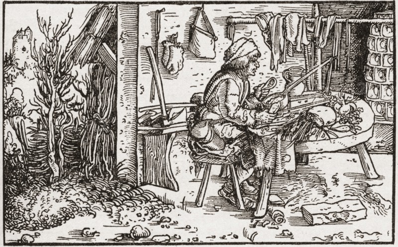 A self employed labourer working at home during the Tudor period in England.