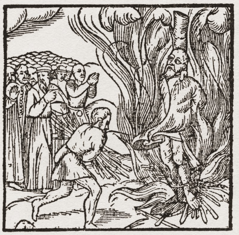 A heretic being burnt at the stake during the Tudor period in England.