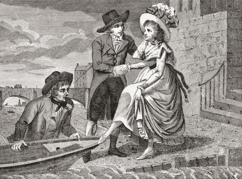 A young man helps a pretty young woman into a wherry which will cross the Thames river in London.
