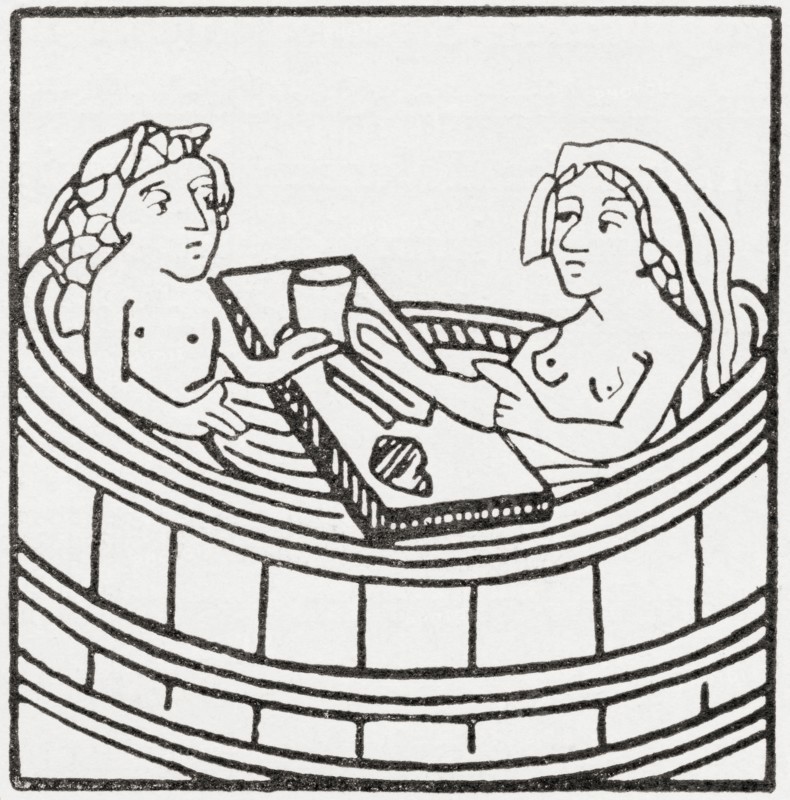 Man and woman together in a bathtub eating and bathing.