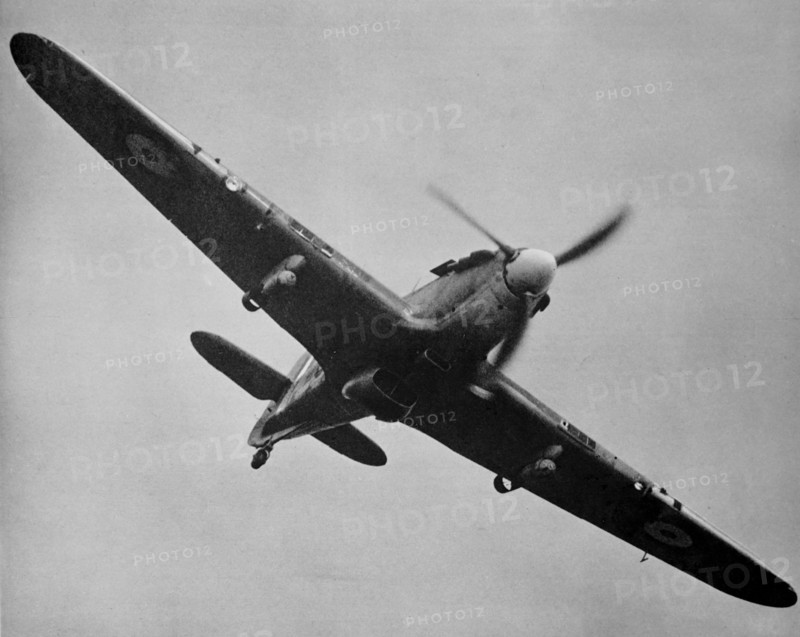 Aircraft, a Hurricane in flight.