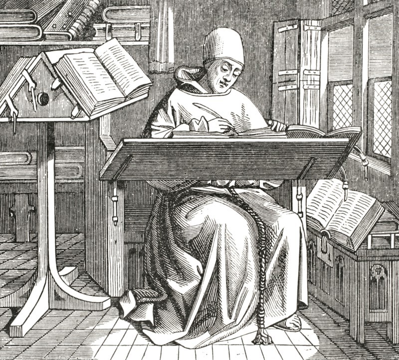 Scribe or copyist, surrounded by open books, working at his desk