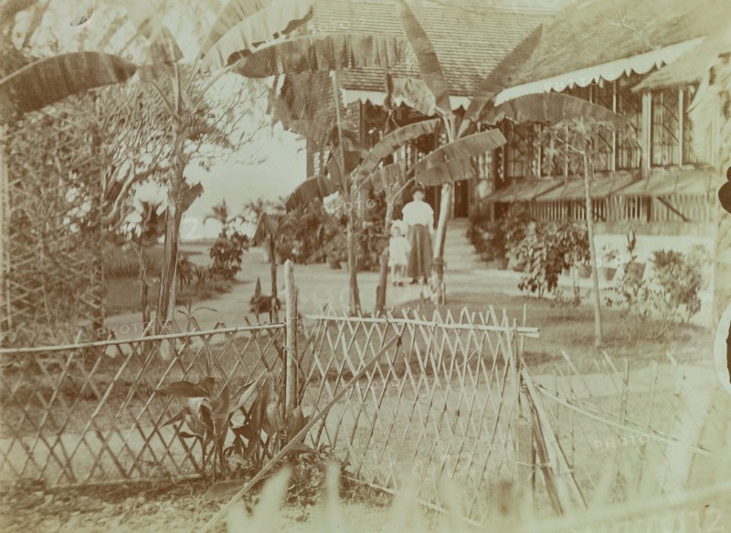 View of Marjory and Anne Wood standing in their garden