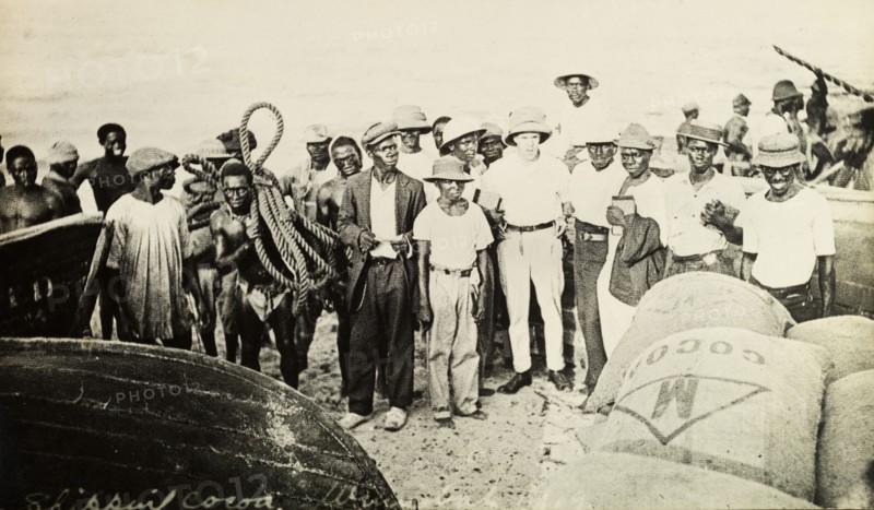 Mr Tamlin and workers on the beach