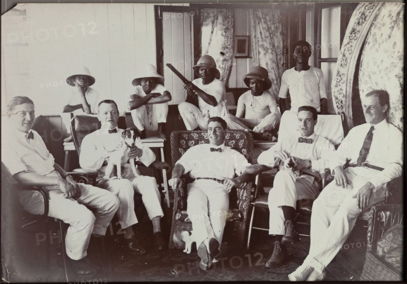 Alfred Tamlin relaxing with colleagues