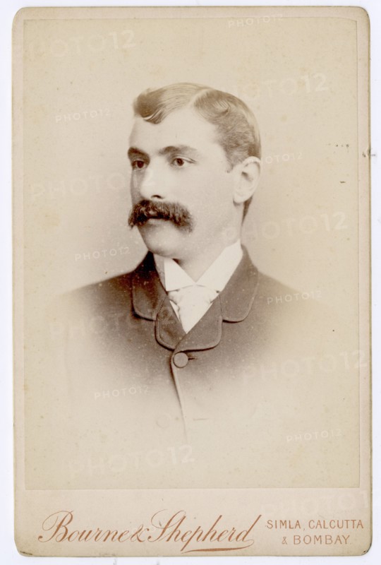 Studio portrait of young European man