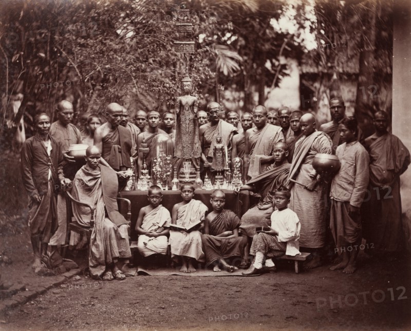 Group of Buddhist monks and altar, Kandy