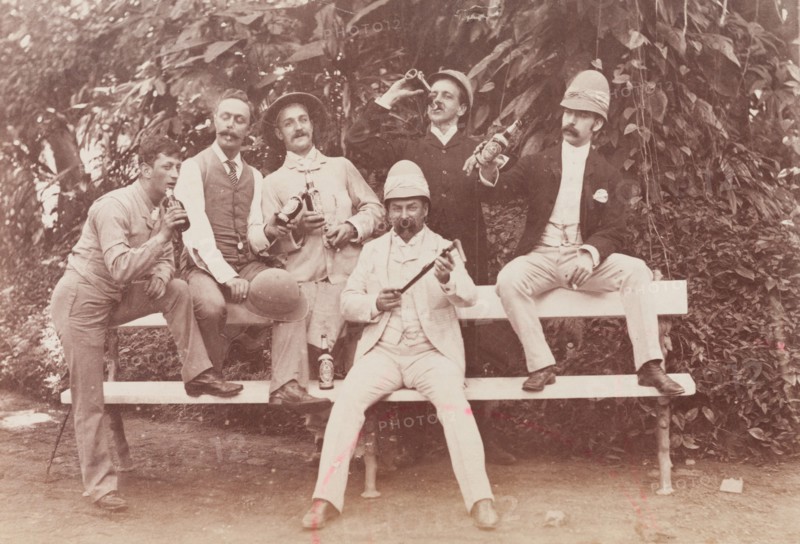 Group of men posing in the Botanical Gardens, Calcutta