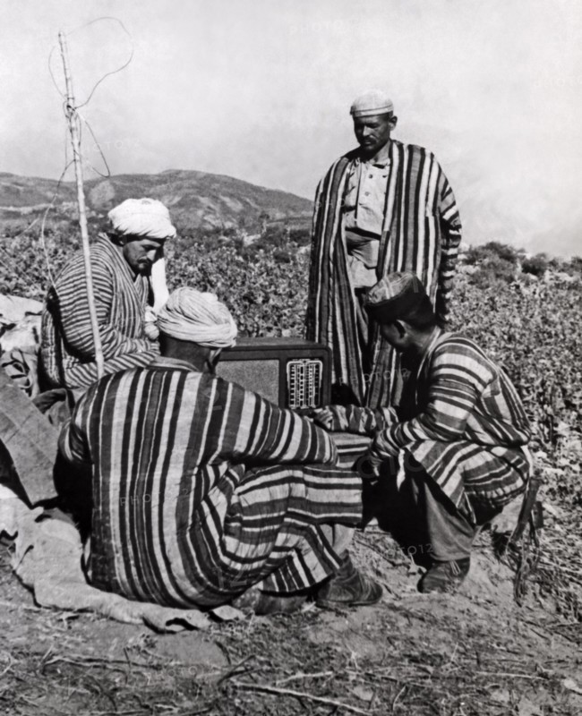 Russian Peasants Listening To Radio