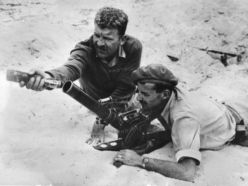 Jewish soldiers training on a 75mm mortar in Tel-Aviv.